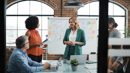 Professional business team engaged in a productive office meeting fostering collaboration discussing new ideas and strategizing for company growth