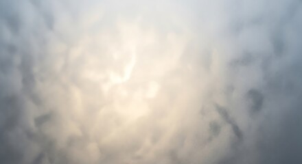 Softly Lit Textured Clouds With Bright Sunlight Shining Through Creating a Peaceful and Serene Atmospheric Backdrop