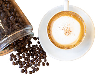 An isolated closeup of a hot, brown cup of roasted coffee beans and a dark beverage