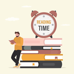 Happy man read book. Alarm clock on books. Reading time, concept. Time to study, enjoying good book, learning. Reader, bookworm standing near stack of various textbooks