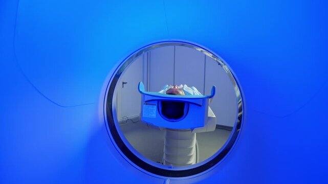 CT scanning of the spine examination for assess for herniated disk, tumors, extent of injuries, blood vessel malformations. Video computed tomography CT scan process for examination of spine.