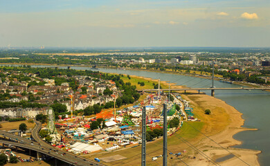 Scenic Aerial View over Dusseldorf and Rhine River, with a fairground