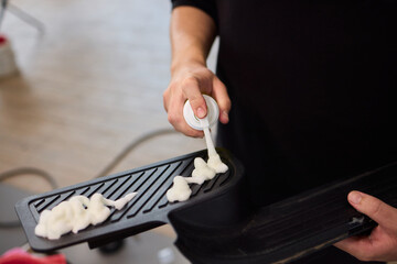 Cleaning with Spray in a Modern Workspace Setup for Enhanced Productivity and Hygiene