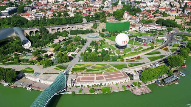 Aerial View of Rike Park, Bridge of Peace, and Modern Architecture in Tbilisi

