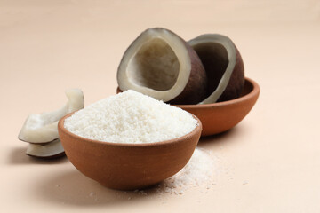 Coconut white powder with dry cut coconut in background