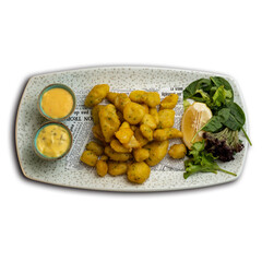Breaded squid, seafood, gourmet dish, fried, plated, closeup, tasty, crispy, fresh, culinary presentation, delicious meal
