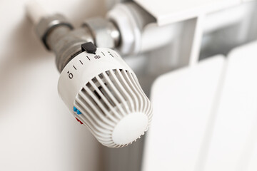 Energy crisis concept. Close up of heating radiator thermostat showing cold temperature