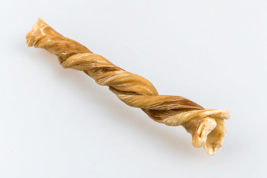 a twisted pastry on a white surface