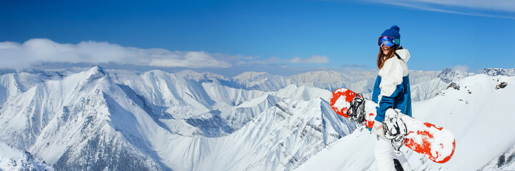 Snowboarder on mountain peak wide banner with copy space © Аrtranq