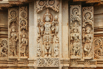Exquisite temple structures from Belur and Halebidu in Karnataka, India, showcasing the intricate Hoysala architecture known for its detailed stone carvings, ornate pillars, and mythological sculpture