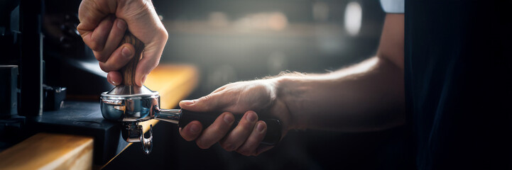 Barista Tamping Coffee Grounds Wide Banner with Copy Space