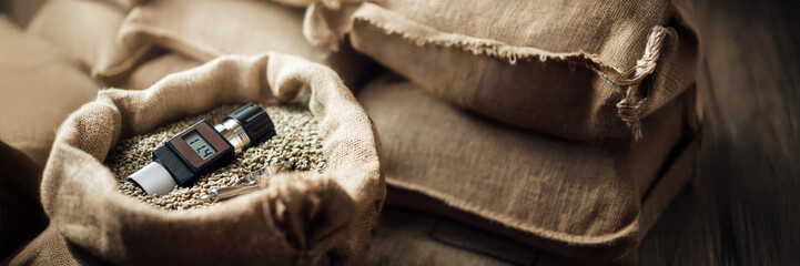 Moisture Meter and Grain in Sack Wide Banner