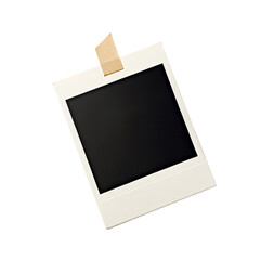 Blank polaroid photo frame with tape on black background for creative design or photo display