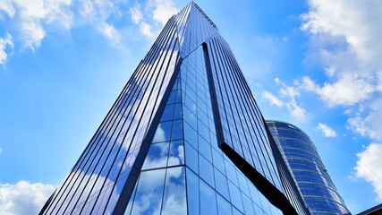 Modern sustainable glass office buildings. Exterior view of corporate headquarters glass buildings...