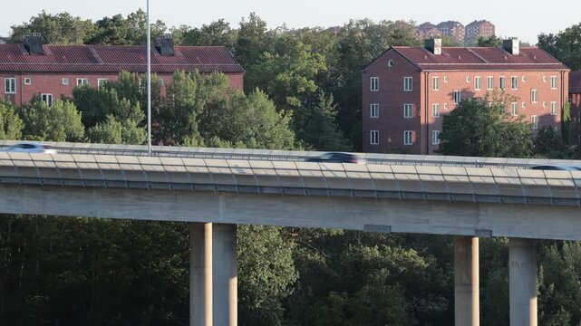 Stockholm, Sweden Traffic at sunset on the E4 elevated highway known as Essingeleden. 