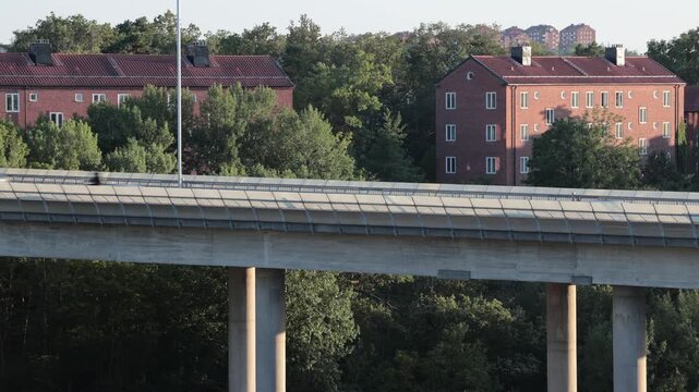 Stockholm, Sweden Traffic at sunset on the E4 elevated highway known as Essingeleden. 