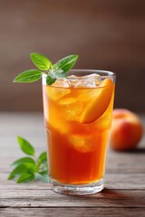 Refreshing peach iced tea with mint and fresh fruit on rustic wooden table in warm ambiance
