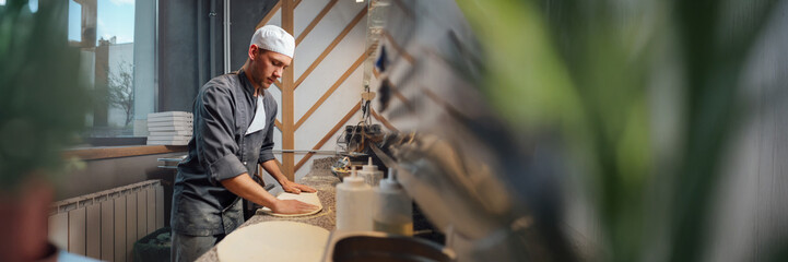 Chef Preparing Dough in Kitchen - Wide Banner