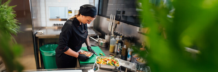 Chef Preparing Food in Professional Kitchen Wide Banner