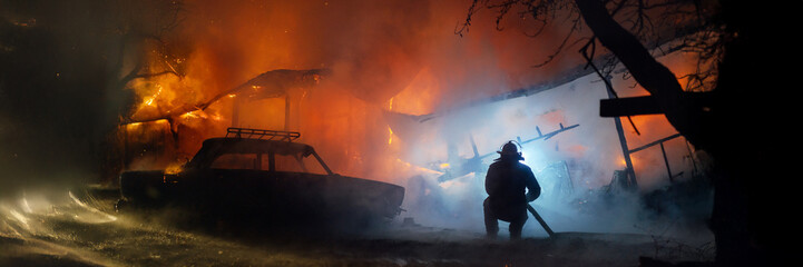 Firefighter Battling Blaze Wide Banner