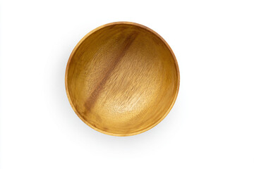 a wooden bowl on a white surface
