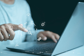 Compliance in business concept. Laws concept. Enforce laws, regulations and standards, comply with business policies, Businessman use tablet with compliance icon on virtual screen.