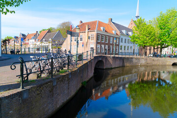 Obraz premium Facades of old historic Houses and trees over canal water, Amersfoort, Netherlands