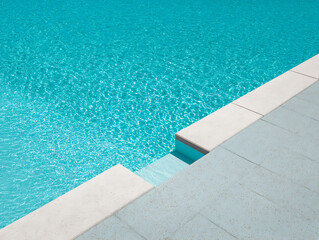 Close-up of Summer, swimming pool with clear water and clean, simple tiled edges