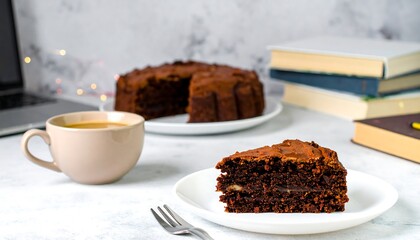 A decadent slice of rich chocolate cake sits on a white plate, accompanied by a warm cup of coffee on a marble countertop, amidst a stack of books.