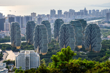 Obraz premium Aerial view of the Beauty Crown Grand Tree Hotel looks like forest in Sanya, Hainan, China