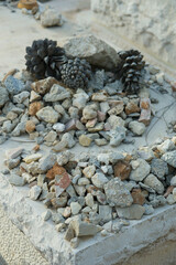 Jewish graves in a cemetery in the Judean Mountains near Jerusalem. Mourners and visitors to a Jewish gravesite traditionally leave behind a small stone or pebble as a sign of their visit.