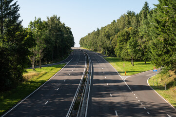 Steep National road N 89 through the woods in Vesqueville Saint Hubert, Belgium