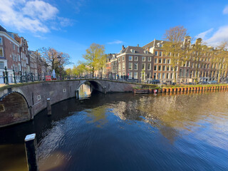 Obraz premium canals and bridges with boats, Amsterdam, Netherlands