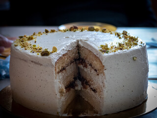 Pistachio and plum cream cake