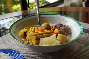 Olla de carne beef soup with vegetables, corn, potato, chayote, plantain, carrot, and beef. Typical dish of Costa Rica and Central America. Beef broth or meat soup accompanied with white rice.