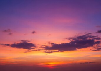 Obraz premium Vibrant sunset sky with orange, pink, and purple hues, creating a beautiful and serene natural atmosphere