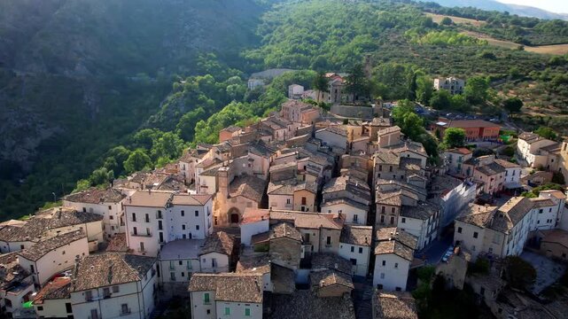 Italy Abruzzo tourism . most beautiful medieval villages  - Anversa degli Abruzzi in National park surrounded by Apennine mountains. aerial drone 4k hd footage