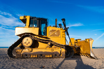 Bulldozer or dozer machinery. Old heavy equipment of bulldozer with sand in bucket. Bull dozer heavy machinery. Industrial heavy equipment. Dozer leveling ground © be free