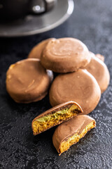 Dubai style chocolate cookies on black table.