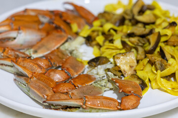 Creamy mushroom and fish Mediterranean Italian Tagliatelle Pasta close up	