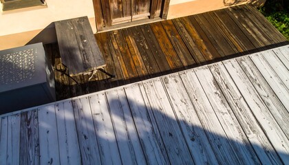Wooden patio with shadows