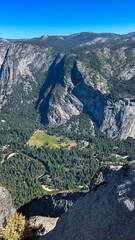 Obraz premium mountain landscape, view of Yosemite Valley including Merced river from Glacier Point, in Yosemite National Park in the western Sierra Nevada Mountains of Central California , USA. July 2025 