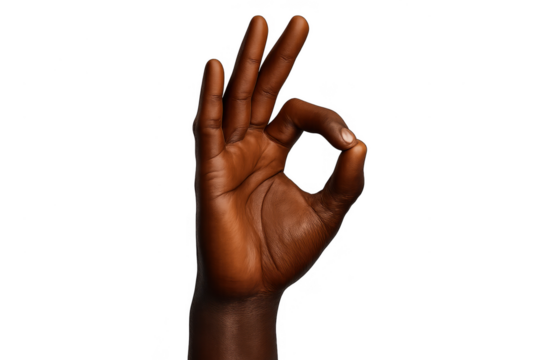 Dark-skinned hand making 'OK' gesture, perfectly isolated on transparent background.