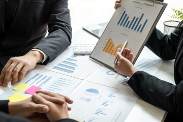 Two business partner team meeting and discussion financial project of investment ideas, presentation and analyzing marketing planning strategy of business making to growth profit and successful