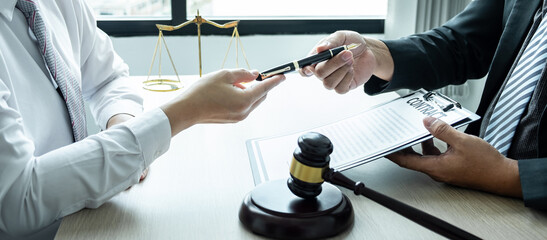 Professional Male lawyer or counselor discussing negotiation legal case with client meeting with...