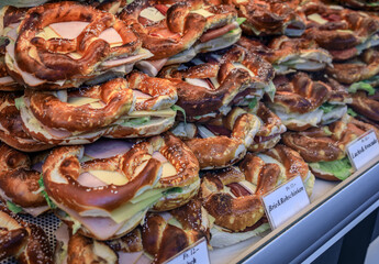 Selection of pretzel sandwiches with various fillings for sale, a Zurich bakery