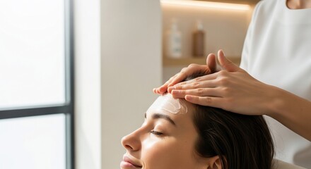 Fototapeta premium Serene Facial Treatment Woman Receives Gentle Skincare Massage in Spa