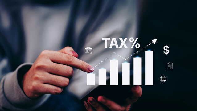 Calculation tax return and VAT concept, woman using smartphone for calculates fill out personal income to pay taxes return form online for tax payment, interest rate with tax and percentage