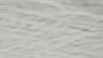 Tokyo,Japan - August 19, 2025: Reflection of water pattern on white wall
