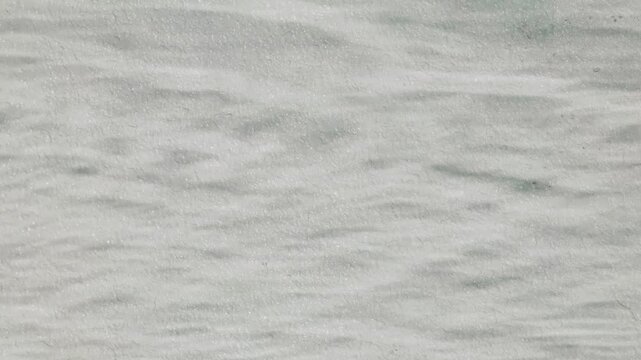 Tokyo,Japan - August 19, 2025: Reflection of water pattern on white wall
